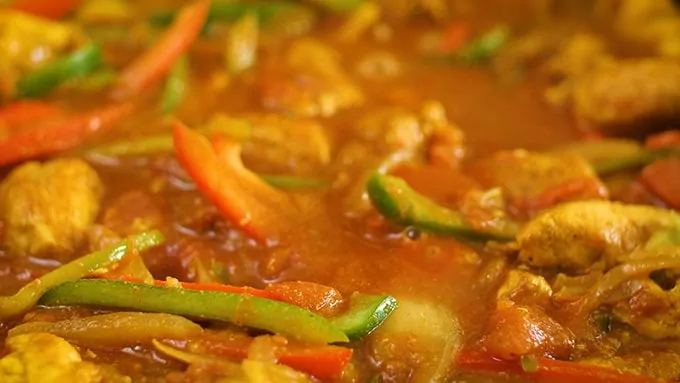 Close up of chicken jalfrezi in a pan
